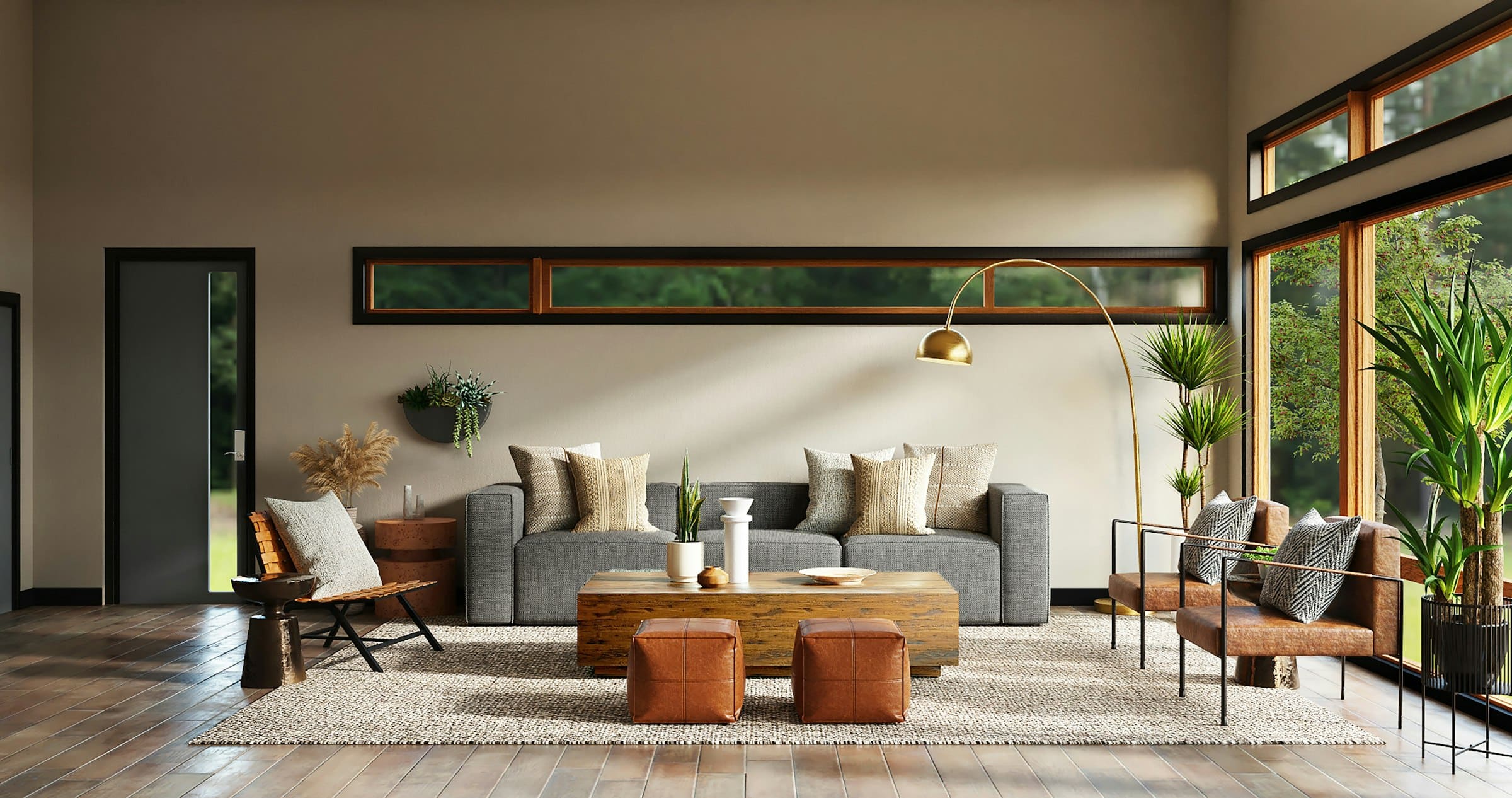 A calm private lounge with low sofas, timber floors and garden views
